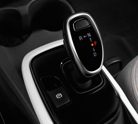 Chevy Bolt Gear Shift A photo of the center console of the 2021 Chevy Bolt, showing the gear shifter